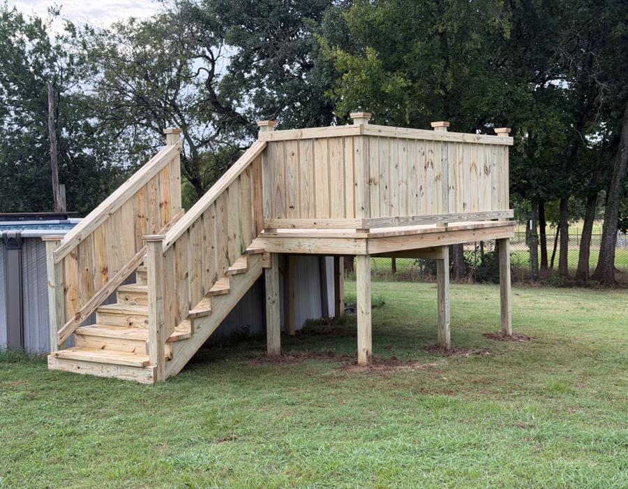 Freestanding above ground pool deck with privacy walls and stairs